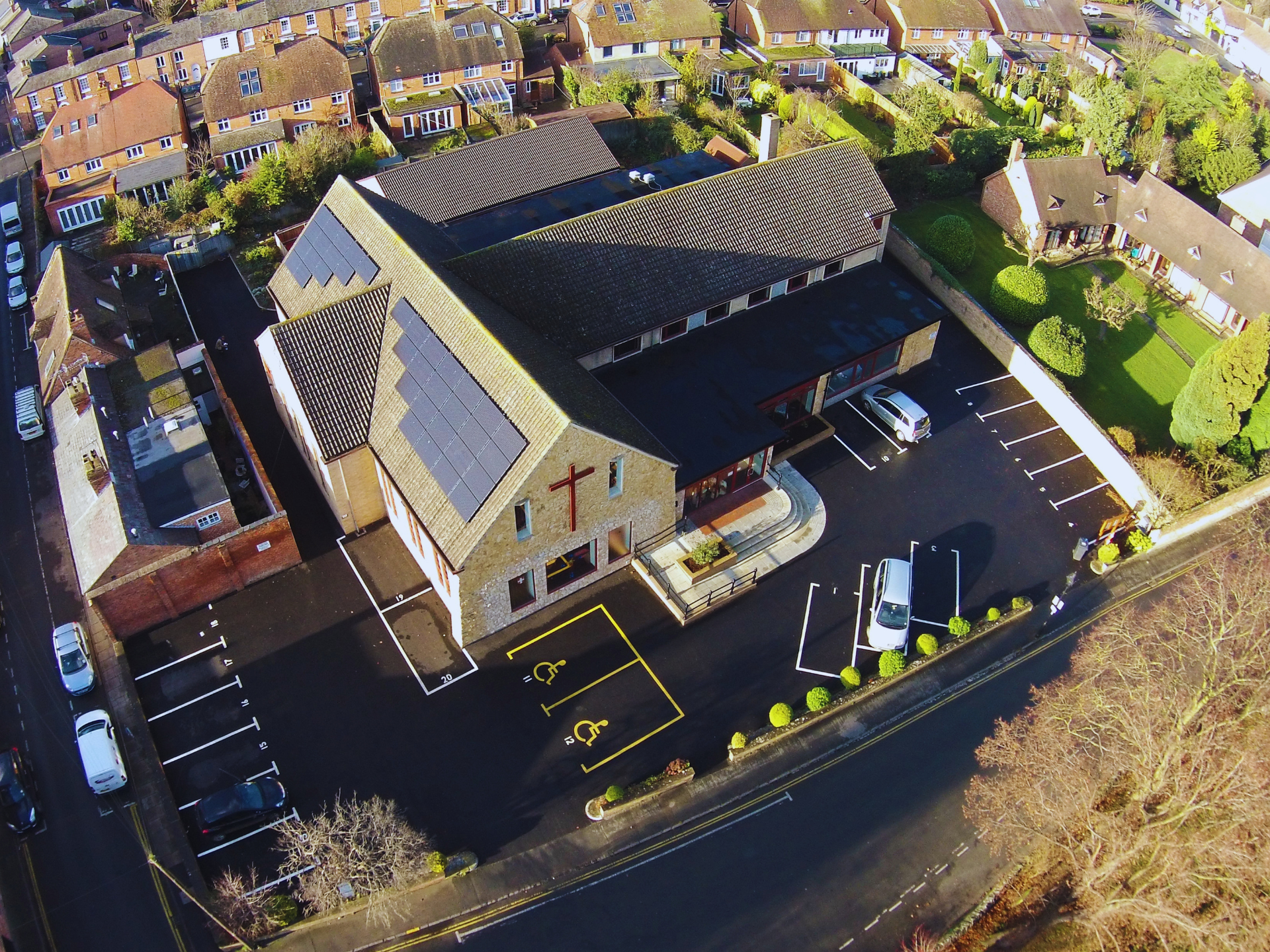 Aerial view of Stratford Methodist Church with solar panels installed on the roof.