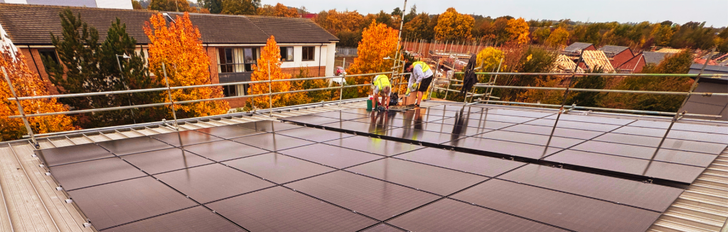 Commercial solar panel system installed on the roof at Apex Recruitment.