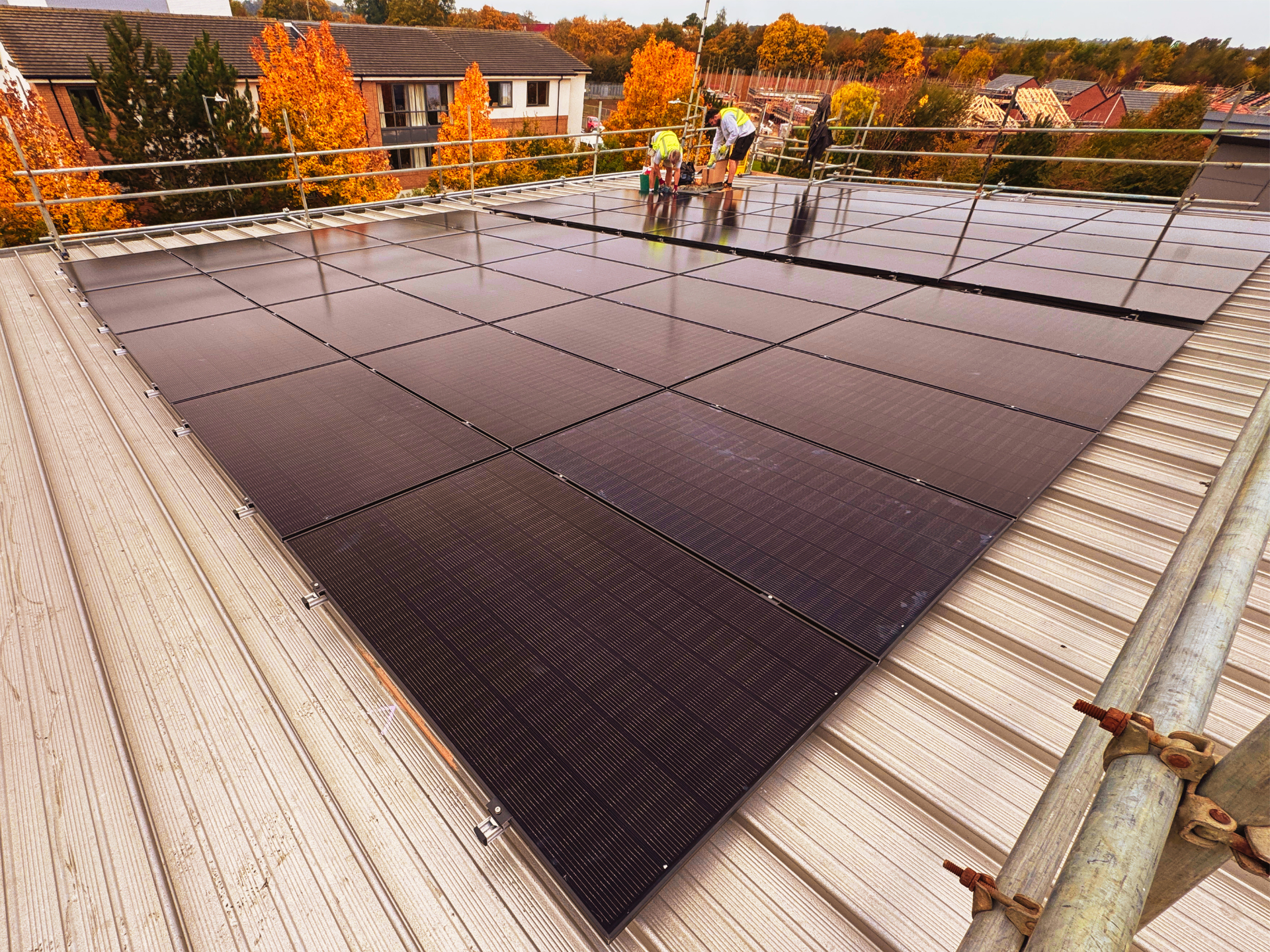 Commercial solar panel system installed on the roof at Apex Recruitment.