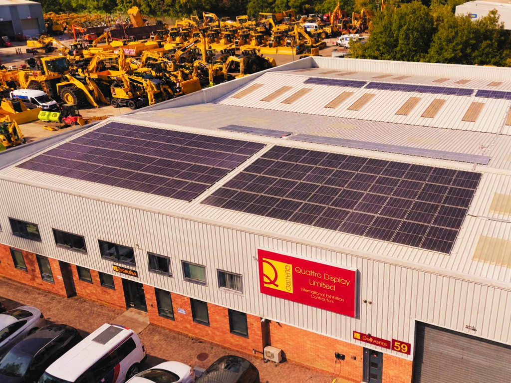 Solar panels installed on the roof of the Quattro Display commercial building.